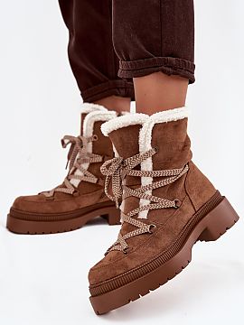 Snow boots Step in style  Women\'s snow boots made of eco-suede are the perfect choice for winter days. The model fastened with a zipper and additional lacing provide