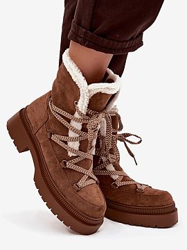 Snow boots Step in style  Women\'s snow boots made of eco-suede are the perfect choice for winter days. The model fastened with a zipper and additional lacing provide
