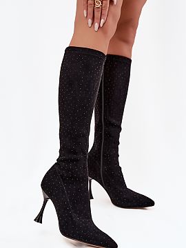 Heeled boots Step in style  Women\'s boots made of soft eco suede are a proposal for women looking for elegance with a touch of glamour. The model set on a slender stil