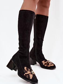 Heeled boots Step in style  Women\'s boots made of soft eco-suede. The model fastened with a zipper ensures comfort of use, and the stable block heel guarantees comfort