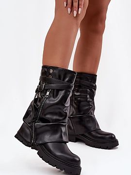 Thigh-Hight Boots Step in style  Women\'s boots reaching mid-calf are a stylish proposition for women who appreciate a fashionable look and everyday comfort. The model stand