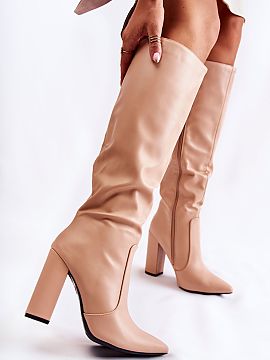 Heeled boots Step in style  Classic high-heeled boots made of eco leather. The shoes have a pointed toe. They are zippered at the full height of the shaft. They have a 
