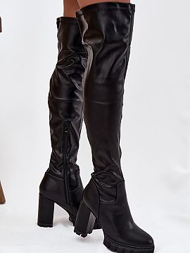 Heeled boots Step in style  Women\'s high over-the-knee boots are a feminine proposition that beautifully accentuates the legs. The model, set on a high column heel, vi