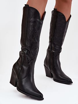 Heeled boots Step in style  Women\'s cowboy-style boots made of eco-leather are a stylish proposal for women who appreciate a fashionable, western character. The model 