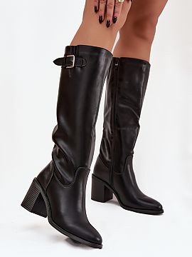 Heeled boots Step in style  Women\'s boots made of eco-leather are an elegant and practical proposition for colder days. The model set on a stable column heel ensures c