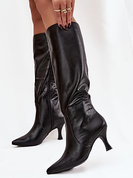 Heeled boots Step in style  Women\'s boots made of eco leather are an elegant proposition for women who appreciate classic and style. The model is set on a stiletto hee