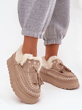 Snow boots Step in style  Ladies\' snow boots made of eco-suede are a fashionable and functional proposition for winter days. The model set on a platform provides com