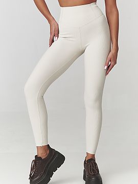 Long leggings Makadamia  Choose comfort and style with our women\'s leggings with a trendy, ribbed structure. Made of elastic, figure-hugging material, they emphasiz