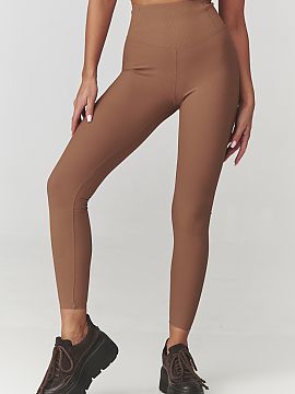 Long leggings Makadamia  Bet on comfort and style with our women\'s leggings with a trendy, ribbed structure. Made of elastic, body-hugging material, they emphasize 