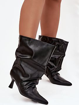 Heeled boots Step in style  Women\'s ankle boots made of eco-leather are a stylish model that combines elegance with a fashionable accent. Set on a slim heel, they beau