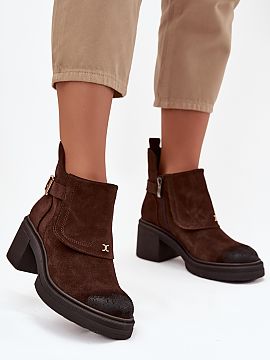Heeled boots Step in style  Women\'s ankle boots made of natural suede are a stylish proposal for the autumn-winter season. The model set on a massive block heel provid