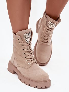 Workery Step in style  Women\'s ankle boots made of faux suede are a charming proposal combining comfort with a fashionable detail. The lace-up and zippered model 
