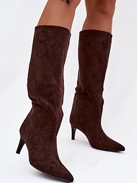 Heeled boots Step in style  Women\'s boots made of faux suede are an elegant proposition for colder days. Slip-on and set on a slender heel, they add lightness and femi