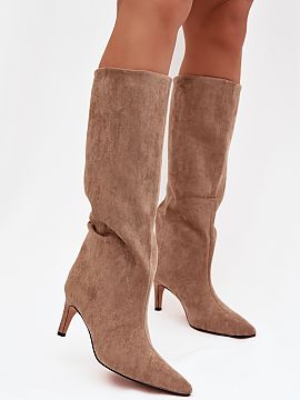 Heeled boots Step in style  Women\'s boots made of eco suede are an elegant proposition for colder days. Slipped on and set on a slim stiletto heel, they add lightness 