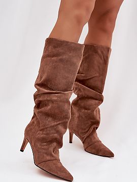 Heeled boots Step in style  Women\'s boots made of soft eco suede are an elegant and feminine proposition for colder days. The model on a slender heel beautifully accen