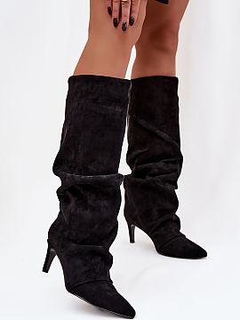 Heeled boots Step in style  Women\'s boots made of soft faux suede are an elegant and feminine proposal for cooler days. The model on a slim stiletto beautifully emphas
