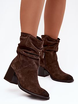 Heeled boots Step in style  Women\'s ankle boots made of natural suede are a combination of elegance and comfort in a modern edition. The model, set on a stable column 
