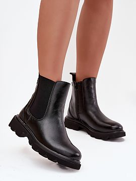 Slippers Step in style  Women\'s ankle boots in the style of riding boots from the Jezzi brand are a classic proposal for colder days. Made of high-quality eco leat
