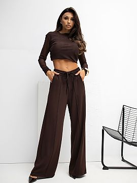 Tracksuit trousers Rue Paris  Soft palazzo-style sweatpants made of an extremely delicate, elastic, and exceptionally pleasant to the touch butter-like material. Thanks t