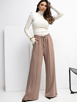 Tracksuit trousers Rue Paris  Soft palazzo-style sweatpants made of incredibly delicate, elastic, and exceptionally pleasant to the touch buttery material. Thanks to the 