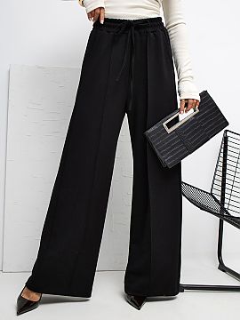 Tracksuit trousers Rue Paris  Soft palazzo-style sweatpants made of incredibly delicate, elastic, and exceptionally pleasant to the touch buttery material. Thanks to the 