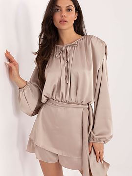 Suit Italy Moda  Jumpsuit with a skirt insert is a unique and eye-catching proposition for formal occasions and parties. Its construction combines the comfor