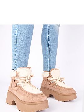 Snow boots Solea  Snow boots with fur lining, tied on a high platform, are the perfect footwear for winter days, combining style, comfort, and warmth. Made of