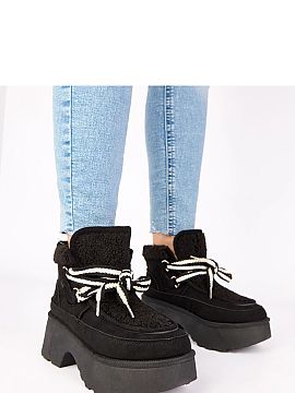 Snow boots Solea  Snow boots with fur lining, tied on a high platform, are perfect footwear for winter days, combining style, comfort, and warmth. Made of hig