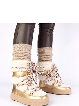 Snow boots Solea  Snow boots with fur lining, laced up, are the perfect footwear for winter days, combining warmth, comfort, and a stylish look. Made of a com