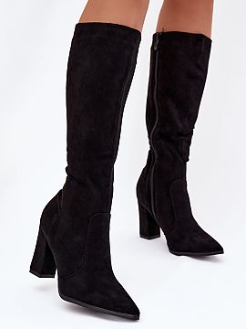 Heeled boots Step in style  Women\'s boots made of eco suede are an elegant model perfect for cooler days. Set on a stable column heel, they emphasize the silhouette an