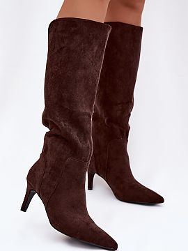Heeled boots Step in style  Women\'s boots made of soft eco-suede are an elegant and feminine proposal for colder days. The model set on a slim stiletto beautifully sli