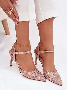 High heels Step in style  Shiny high heels are the perfect choice for evening outings and special occasions. Fastened with an adjustable buckle strap, they provide co