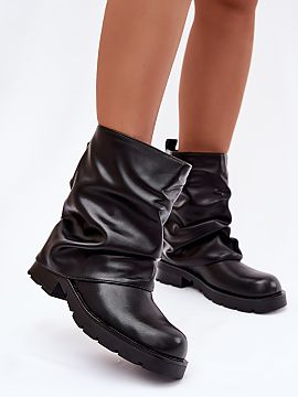 Botki Step in style  Women\'s ankle boots made of eco leather are a comfortable and stylish option for cooler days. Set on a flat heel, they provide comfort duri