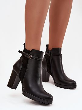 Heeled boots Step in style  Women\'s ankle boots made of eco leather are an excellent proposal for the autumn-winter season. The model is set on a stable column heel, w