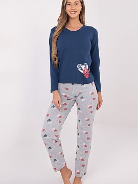 Pyjama Forever Pink  Comfortable, two-piece women\'s pajamas made of soft, breathable cotton, perfect for peaceful nights and relaxing evenings. The set includes