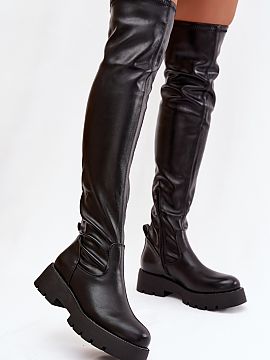 Thigh-Hight Boots Step in style  Women\'s knee-high boots are an eye-catching model that beautifully accentuates the legs. The slip-on style complemented by a zipper at the 