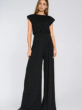 Suit Nife  Elegant women\'s jumpsuit in a regular fit cut, combining comfort with modern style. Made of soft knit fabric adorned with black sequins, ad