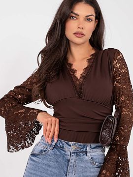 Shapewear Body Italy Moda  Elegant bodysuit made of a blend of polyester and elastane, combining comfort with refined style. The model of standard length with a sweeth