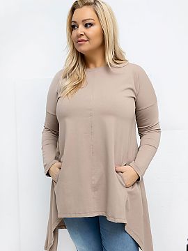 Plus size blouse Relevance  An asymmetrical plus size casual blouse is the perfect everyday proposal, combining comfort with a trendy look. The model with a shorter fro