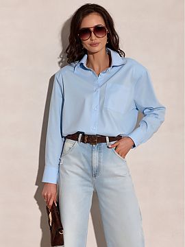 Long sleeve shirt Roco Fashion  The shirt with a loose, modern cut was designed with comfort and universal style in mind, perfect for everyday wear. The model stands out wi