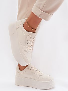 Sports footwear Step in style  Stylish women\'s sneakers made of eco leather are the perfect combination of comfort and modern style. Set on a chunky platform, they attrac
