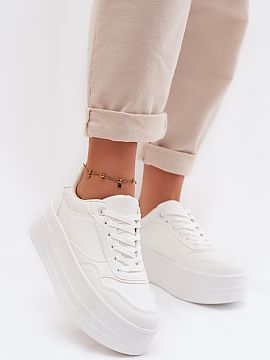 Sports footwear Step in style  Stylish women\'s sneakers made of eco leather are the perfect combination of comfort and modern style. Set on a massive platform, they attra