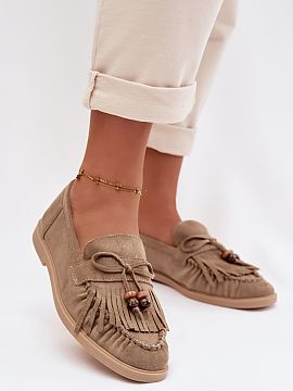 Moccasins Step in style  Women\'s loafers made of faux suede are a stylish proposition for everyday wear. The front of the shoe is adorned with decorative fringes an