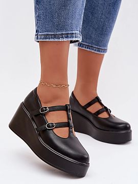 Heeled boots Step in style  Women\'s eco-leather shoes are a comfortable and elegant proposition for everyday wear. The model set on a wedge heel ensures comfort and sl