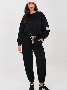 Set Italy Moda  Stylish sweat suit in a casual edition is the perfect proposal for everyday stylizations. The smooth pattern gives it a universal character,