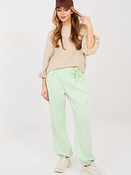 Tracksuit trousers Italy Moda  Elegant jogger-style sweatpants are a combination of comfort and stylish finishing. The model with long legs ending in cuffs fits perfectly 