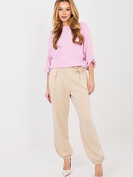 Tracksuit trousers Italy Moda  Elegant jogger pants are a combination of comfort and stylish finish. The model with long legs finished with ribbing fits perfectly on the s