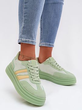 Sport Shoes Step in style  Stylish women\'s sneakers made of eco suede are a comfortable option for everyday wear. The model set on a platform subtly emphasizes the si