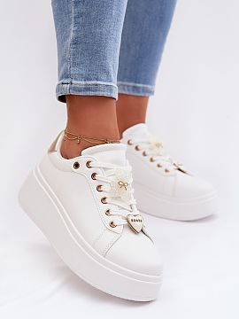 Sport Shoes Step in style  Stylish women\'s sneakers made of eco leather are an original proposal for lovers of fashionable details. The model set on a platform subtly