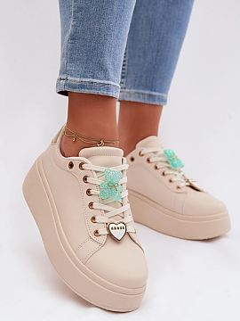 Sport Shoes Step in style  Stylish women\'s sneakers made of eco-leather are an original proposition for fans of fashionable details. The model set on a platform subtl